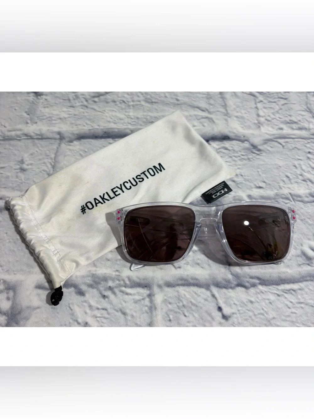 Oakley “Holbrook” customized clear frame/pink detail sunglasses + sleeve